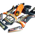 pitbike černé plasty TTR s polepy Rockstar/oranžové typ 2, Stomp, DemonX, WPB